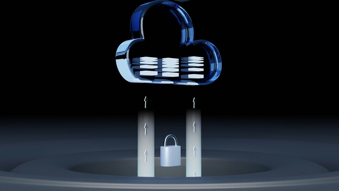 Illustration of a glass cloud holding stacked data layers above a silver padlock, representing secure off-site backups